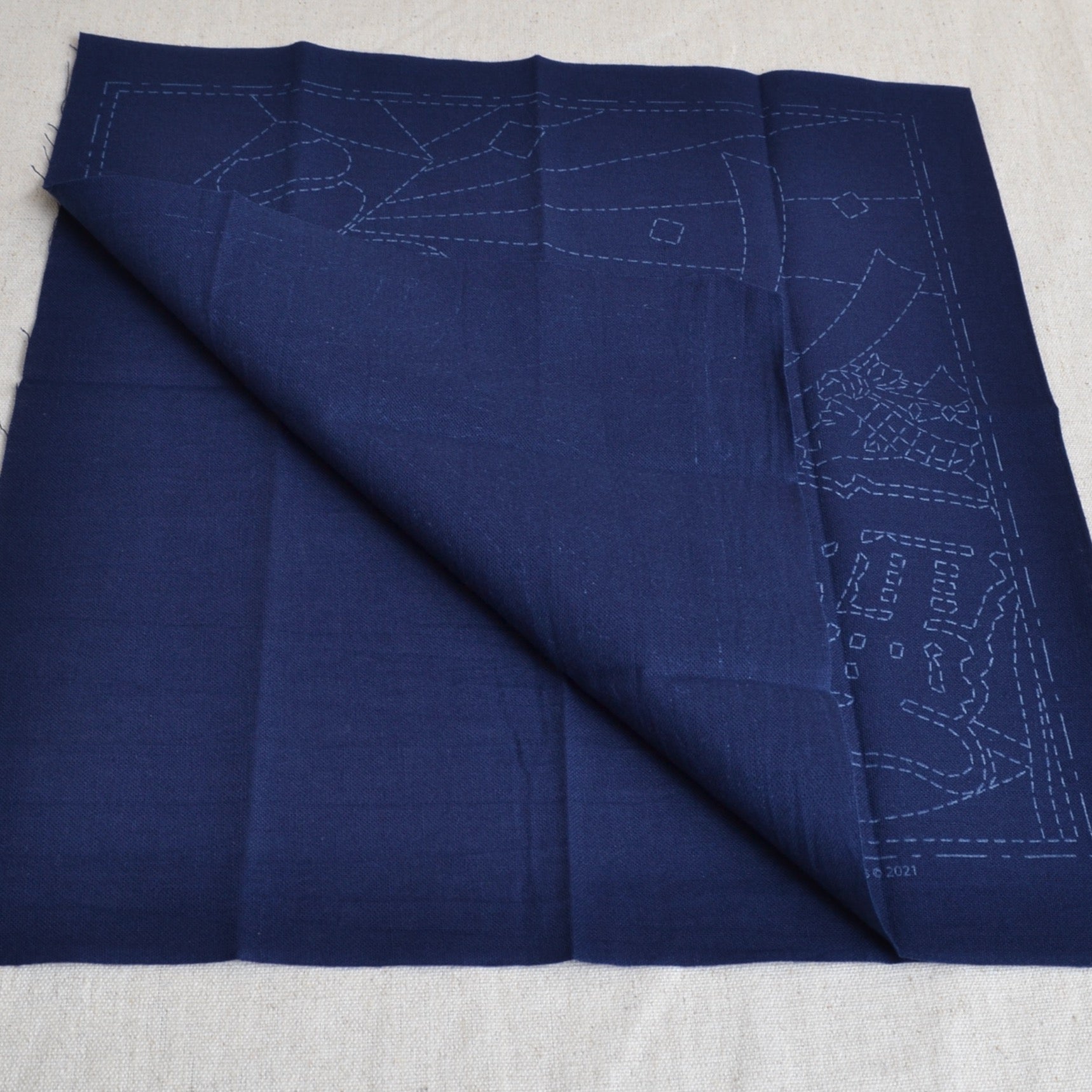 Showing both sides of pre printed sashiko cloth
