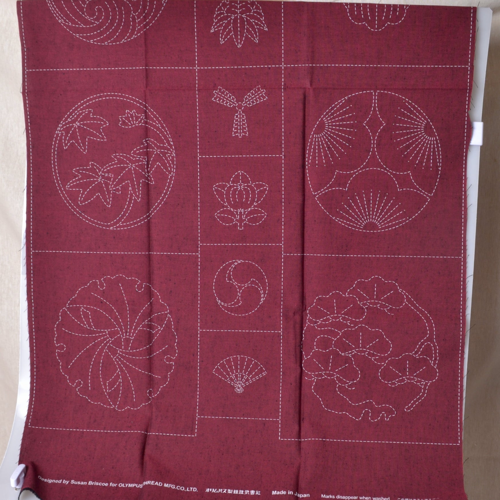 Tsumugi fabric with sashiko stencilled  preprinted family crest 