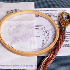 Owl embroidery kit containing thread, hoop, needle and instructions.