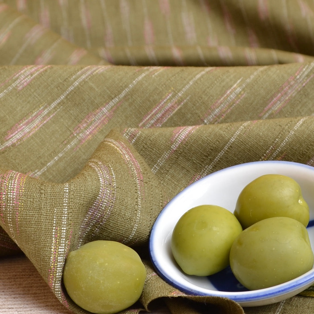 Olive green yarbane (arrow) printed fabric from Morikiku