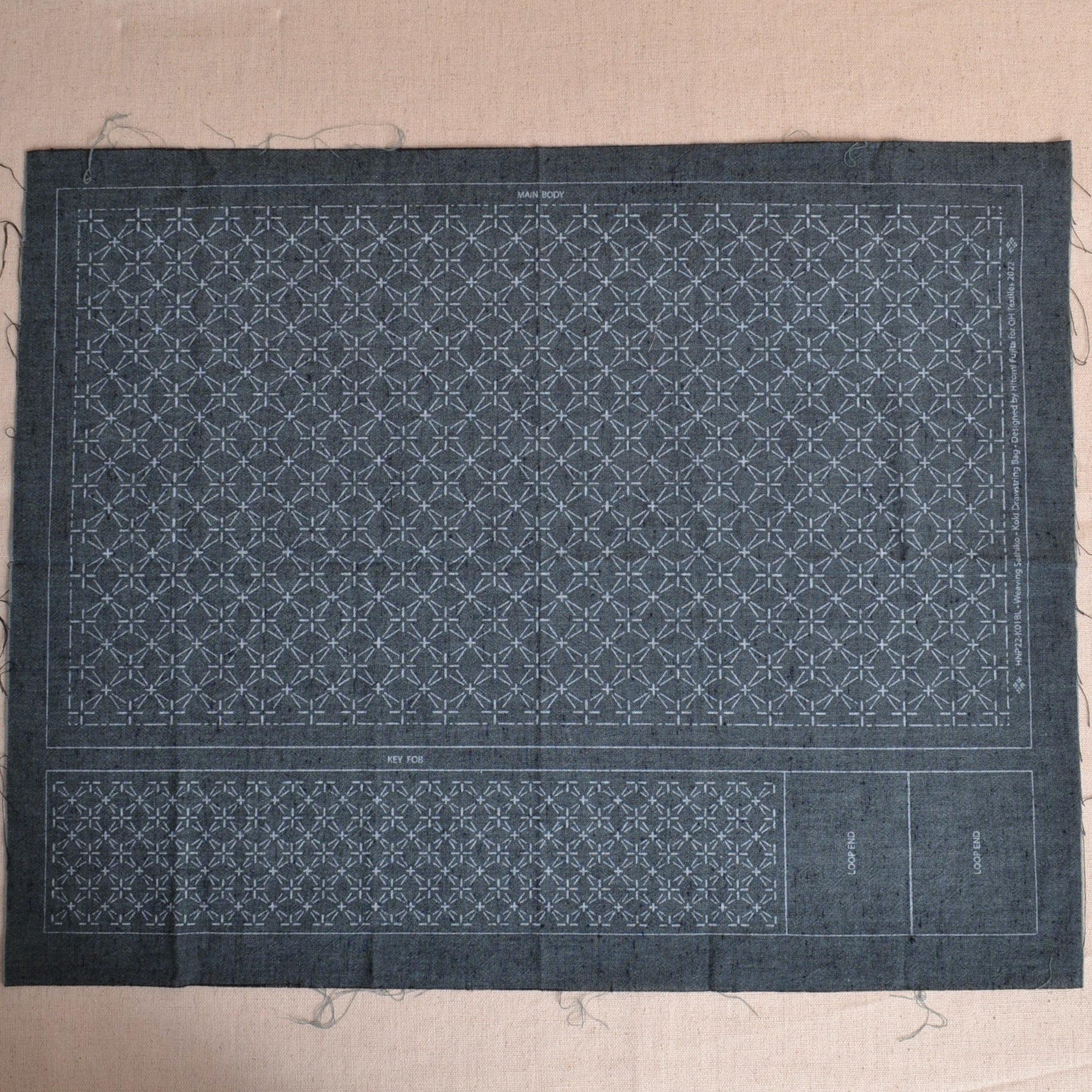 Hand printed kuguri sashiko fabric for drawstring bag