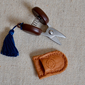 Cohana mini scissors with silk tassel, wood finger pads and soft leather sheath