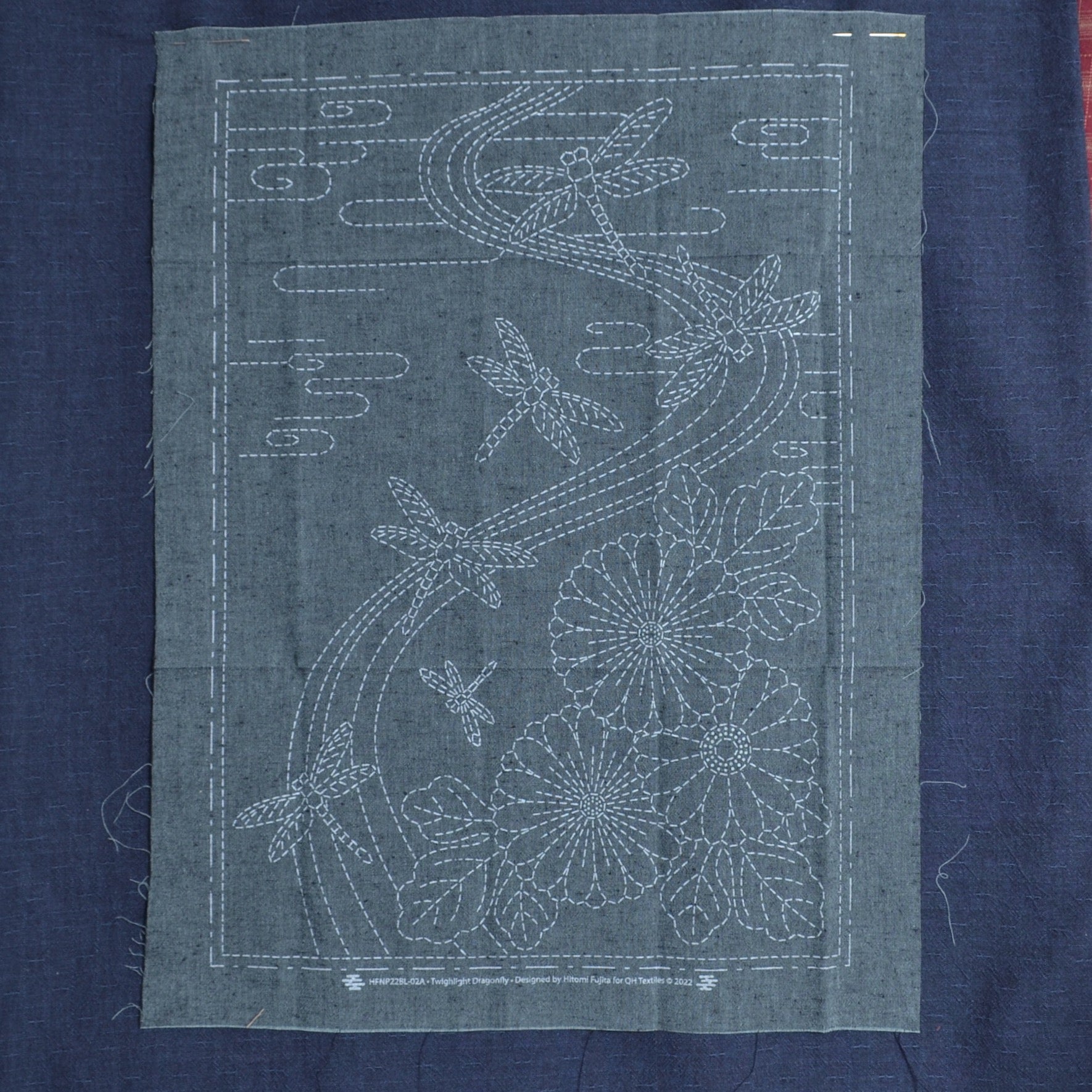 sashiko dragonfly pre-printed wash out design on blue fabric