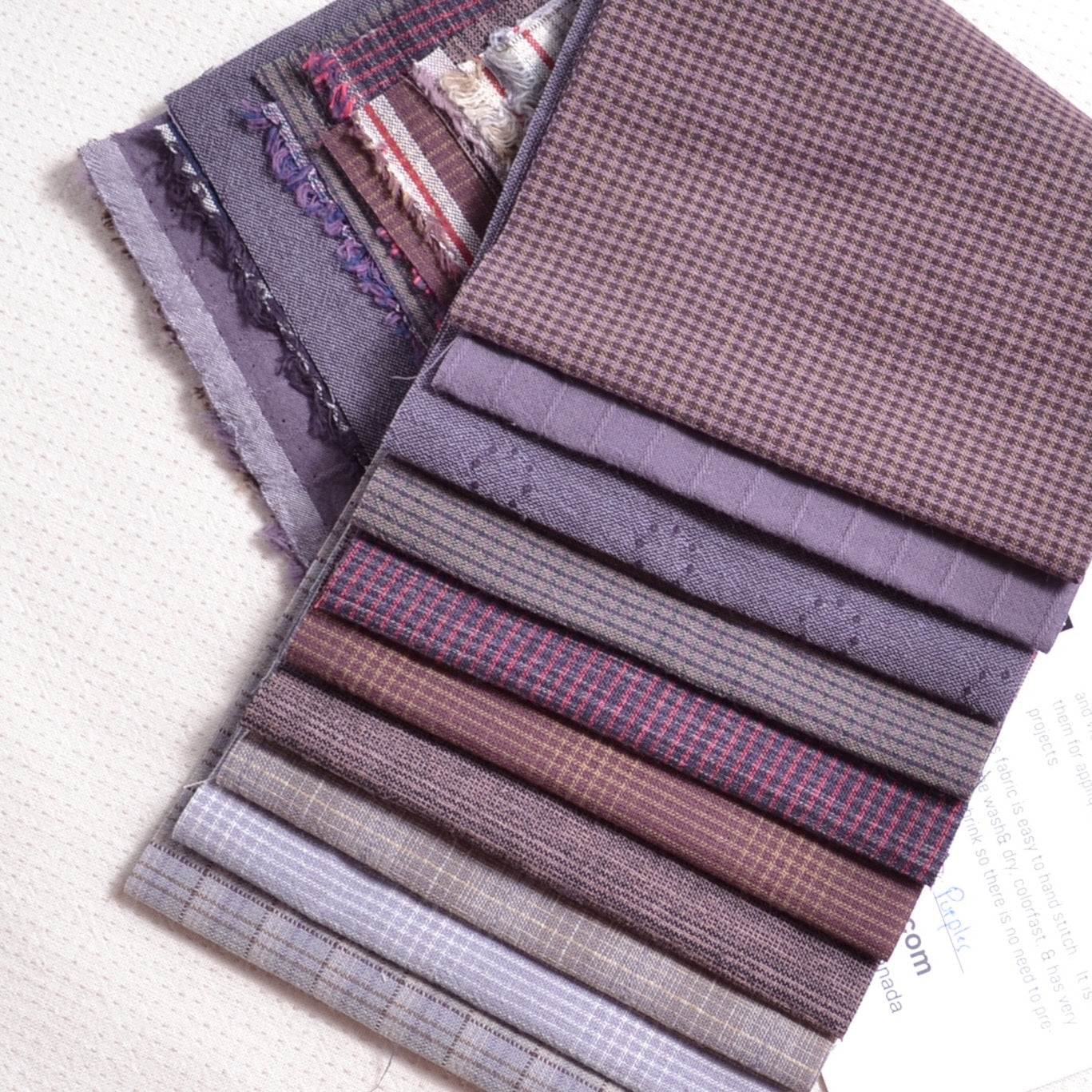 yarn dyed purple small cuts of cotton fabric