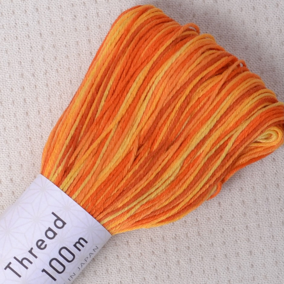 Olympus sashiko thread, variegated orange, 100 meter skein