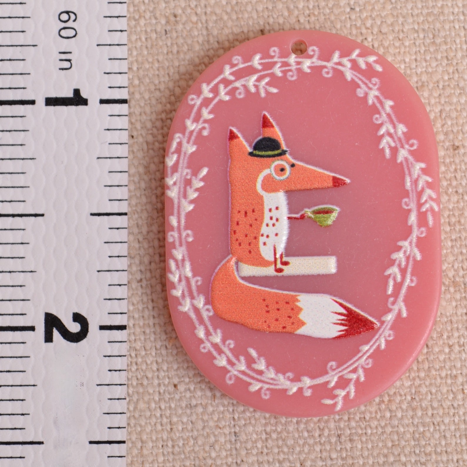 Gentleman fox on needle minder suggests you take a break and have a cup of tea 