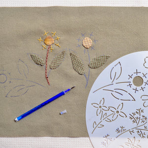 embroidery stencil used to make repeats, plus applique