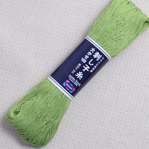white sashiko thread, Olympus 100 meter skein, bright green #107