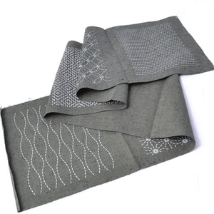 Green sashiko mending patch
