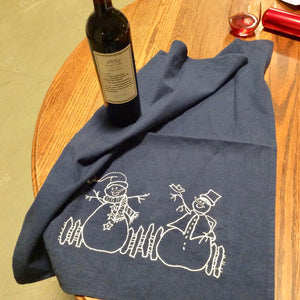 Embroidered snowmen on kitchen towel