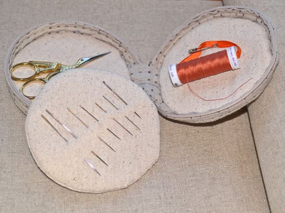 Inside of Round Sewing Kit