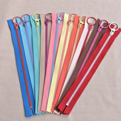 bi-color zippers exposed
